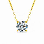 Round moissanite solitaire necklace with a four-prong setting and chain attached at both sides.