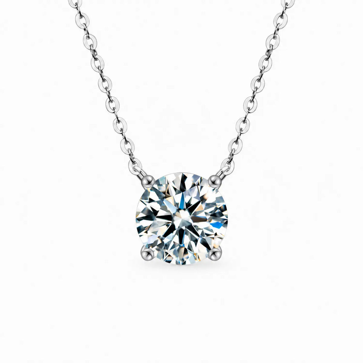 Round moissanite solitaire necklace with a four-prong setting and chain attached at both sides.