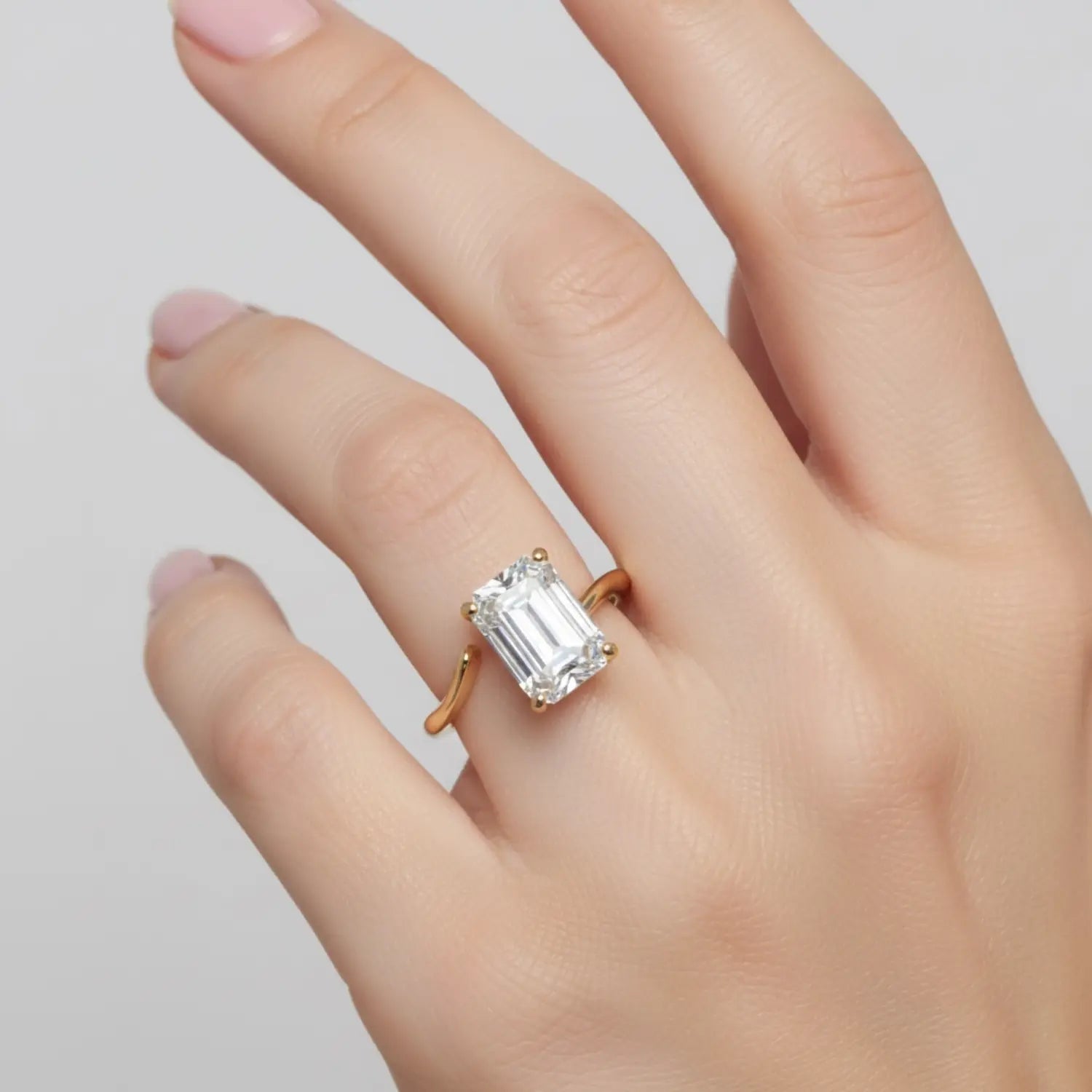 Emerald Moissanite Ring with Spiral Band